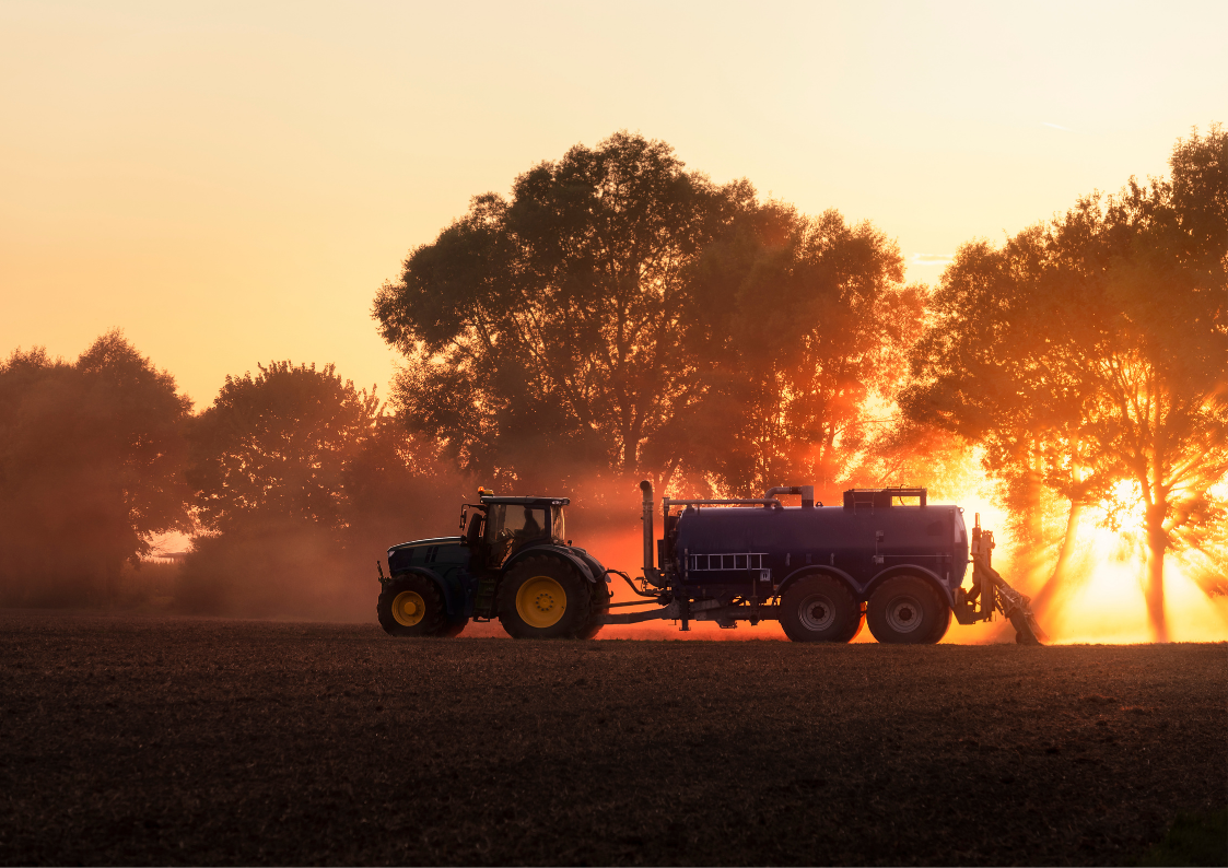 An image of a tractor fertilising crops and nature's services
